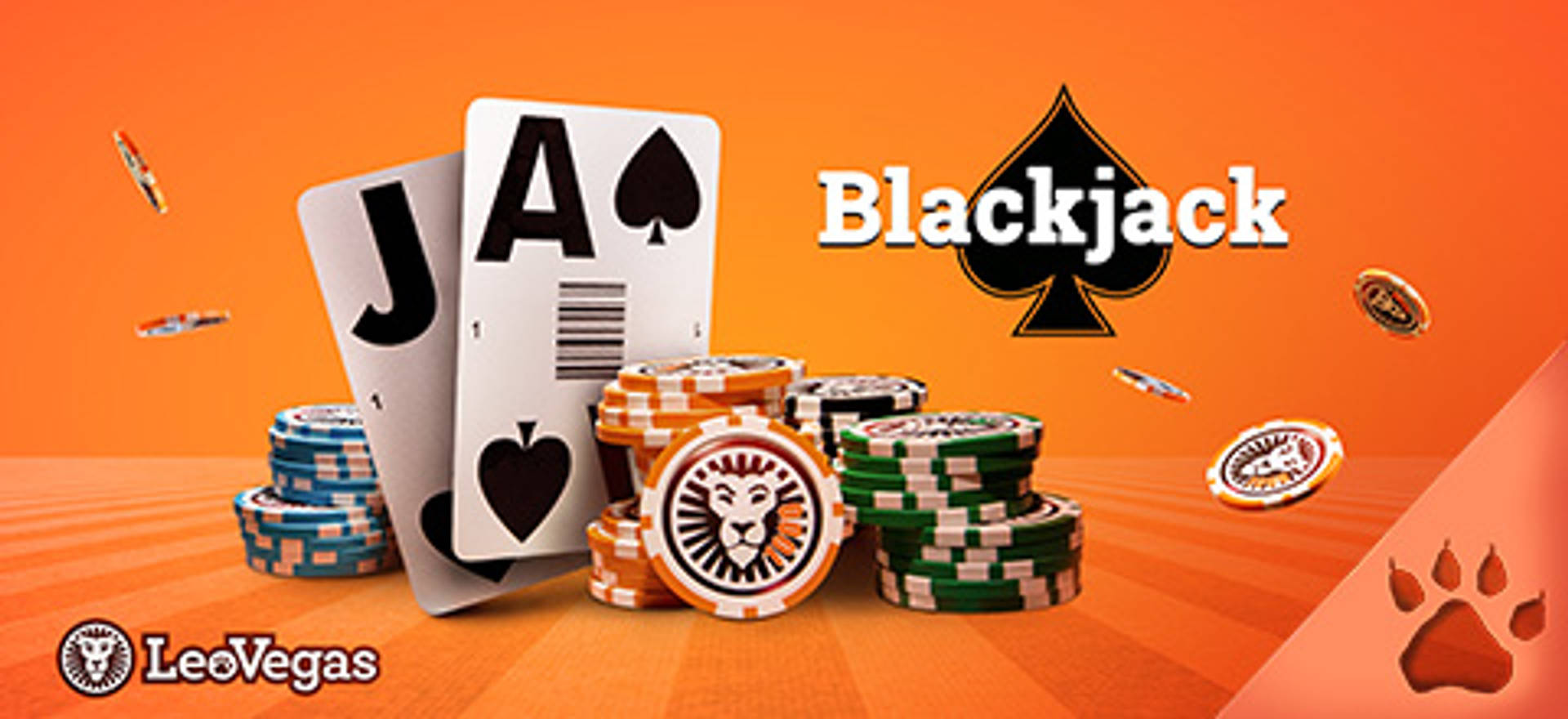 Blackjack con cartas, fichas y el logo de LeoVegas sobre un fondo naranja.